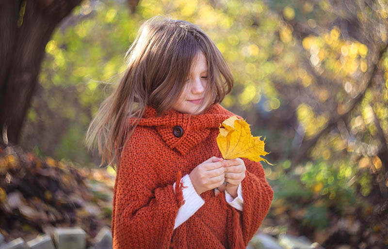 girl child red knitted poncho leaf | knitted poncho