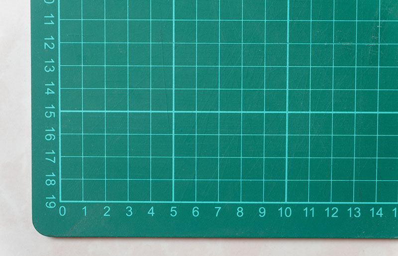 green paper cutting mat background | diy sewing room organization ideas
