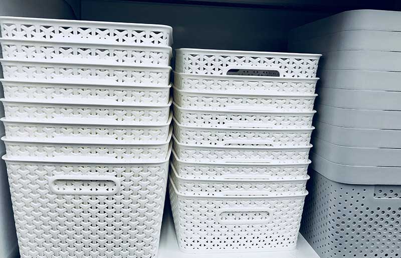 stack plastic baskets on shelf | fabric stash management