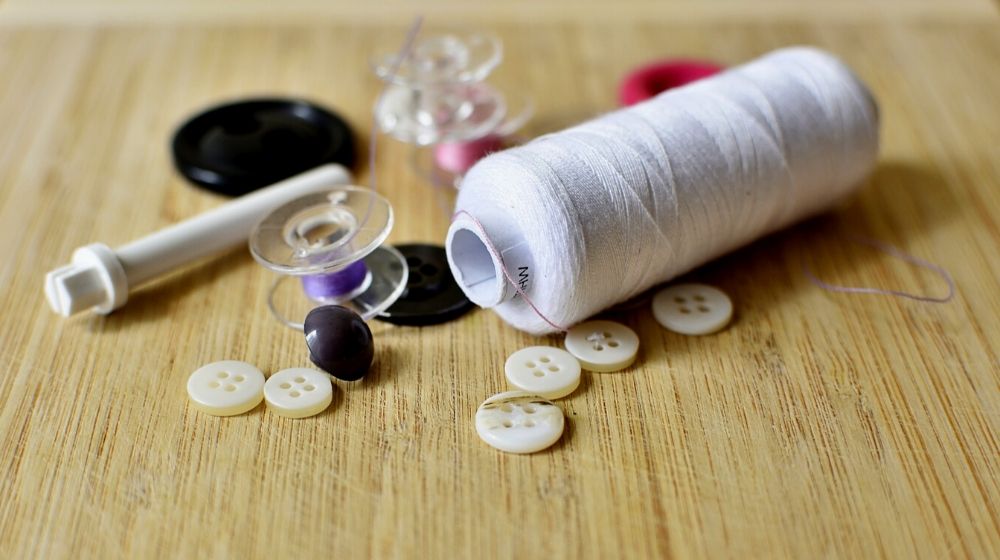 yarn thread and buttons for sewing | How To Sew A Button Like An Expert