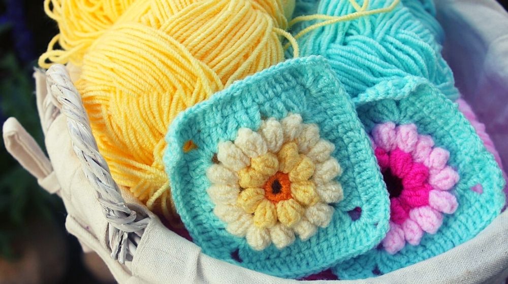colorful crochet coasters and colored yarn | Free Creative Patterns For Crochet Coasters To Keep You Busy | Featured