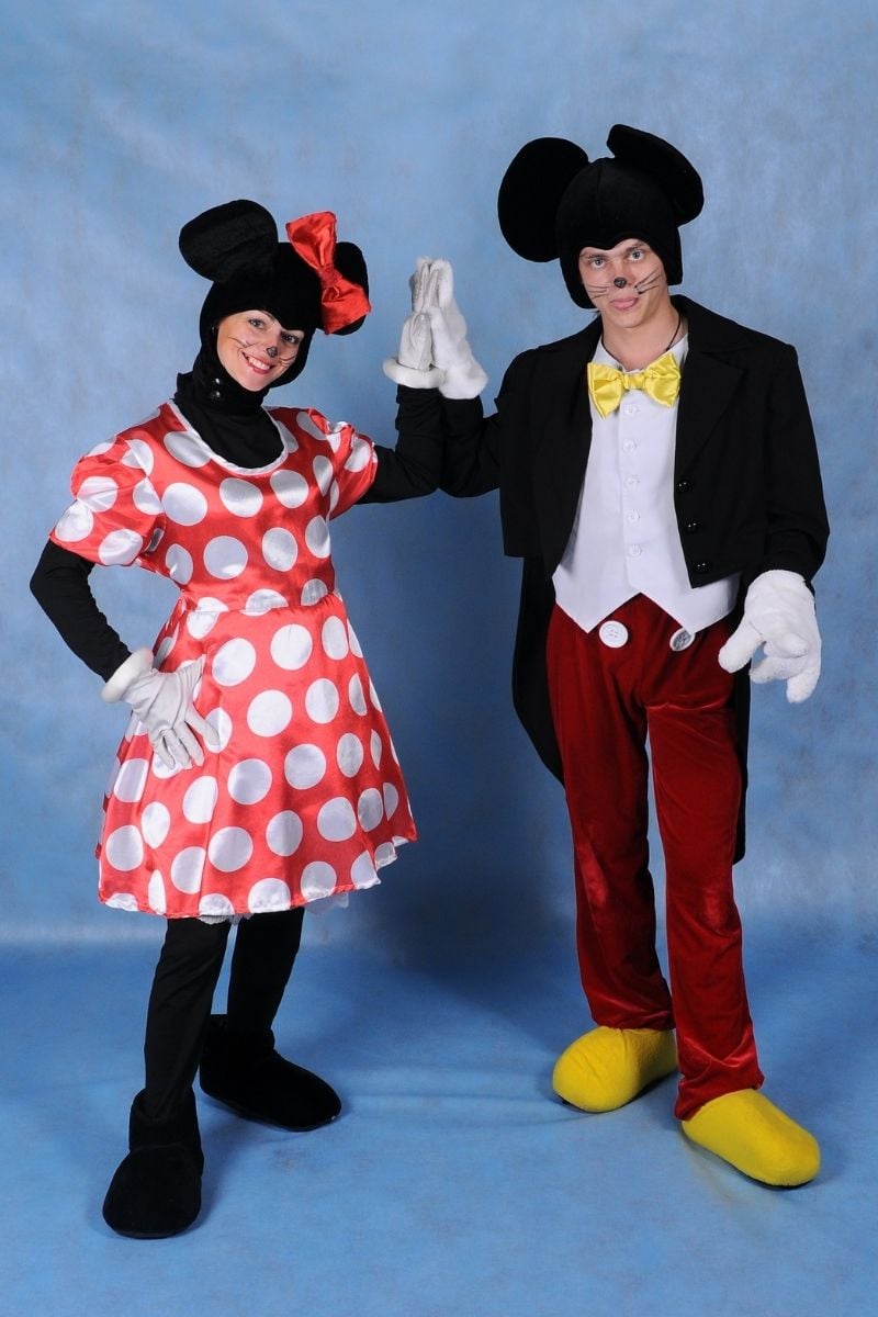 Animator for children in a Mickey mouse costume and a Mini mouse girl in the Studio in costume | hilarious couples costumes