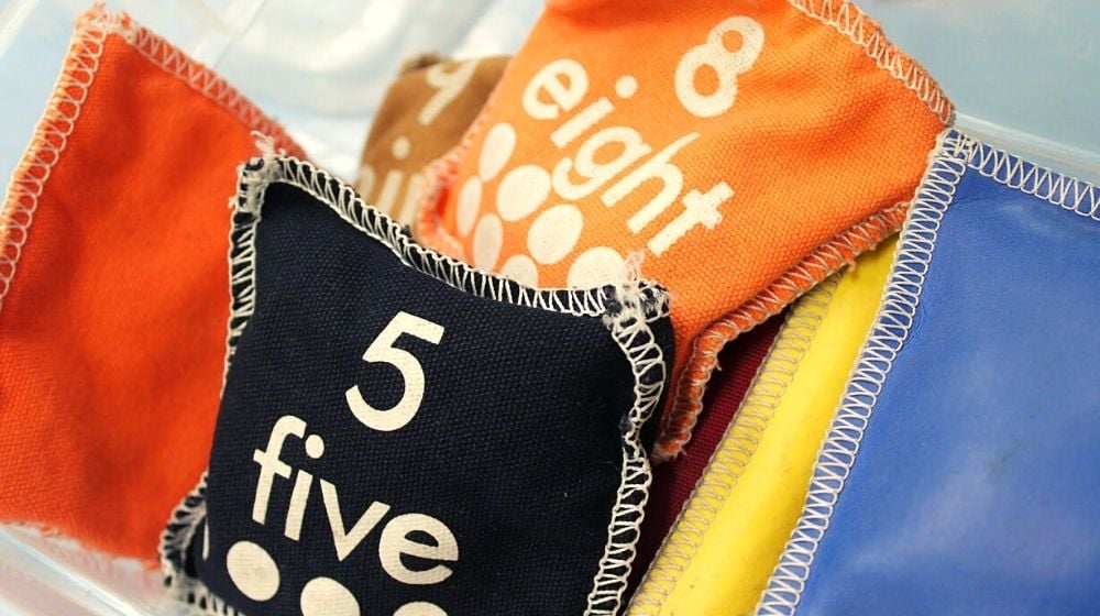 numbered and colorful bean bags for kids | How To Sew Tossing Bean Bags For Kids And 5 Fun Games To Play With It | Featured