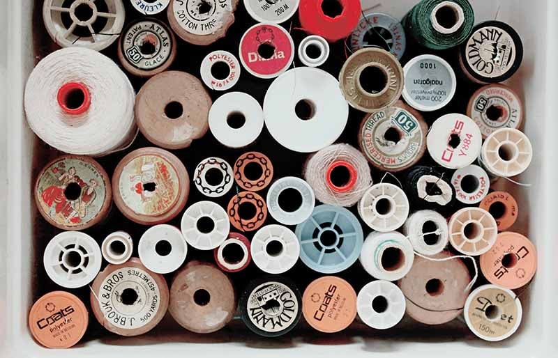 assorted color threads | diy sewing room organization ideas