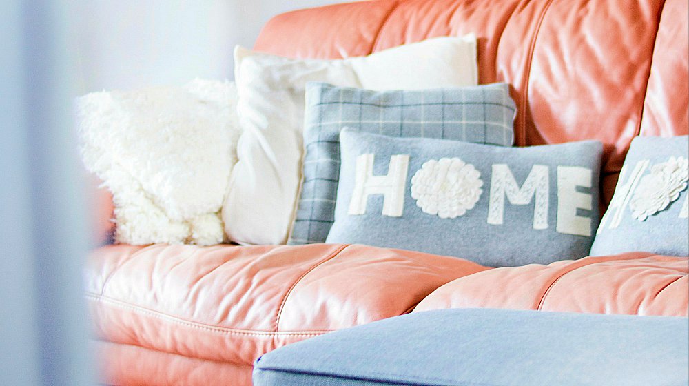 Brown and Grey Leather Sofa With Throw Pillows | Sewing Projects For The Living Room | Featured