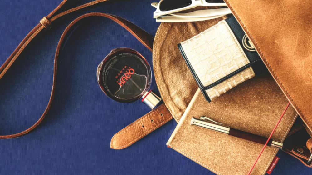 brown leather crossbody bag with white framed sunglasses| How to Sew Your Own Purse Organizer | Step by Step Guide | Featured