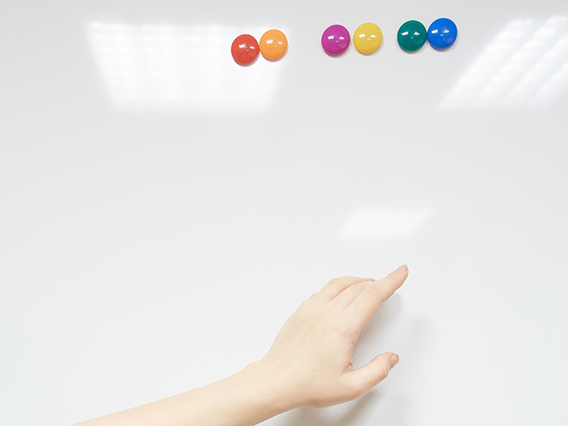 close womans hand pointing finger blackboard | diy sewing room organization ideas