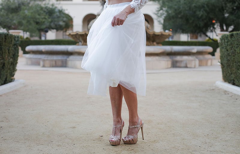 woman wearing white skirt | winter trends