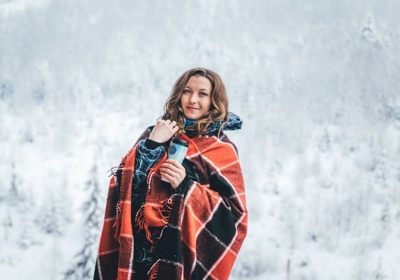 woman wearing red and black checkered cape | woman wearing red and black checked cape photo | easy sewing projects clothes