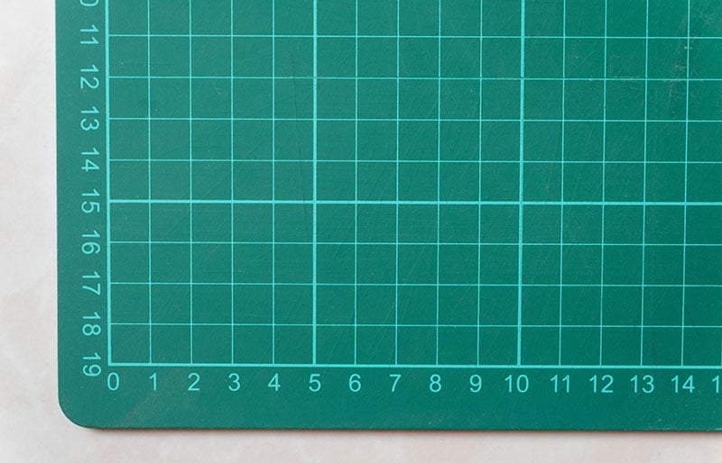 green paper cutting mat background | diy sewing room organization ideas