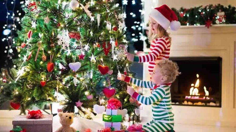 happy little kids matching red green kids | Kids Christmas Pajamas To Feel Extra Festive | Holiday Sewing Projects | Featured