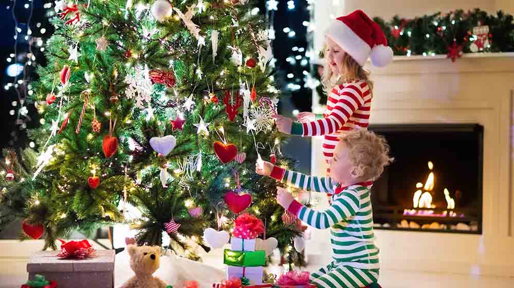 happy little kids matching red green kids | Kids Christmas Pajamas To Feel Extra Festive | Holiday Sewing Projects | Featured
