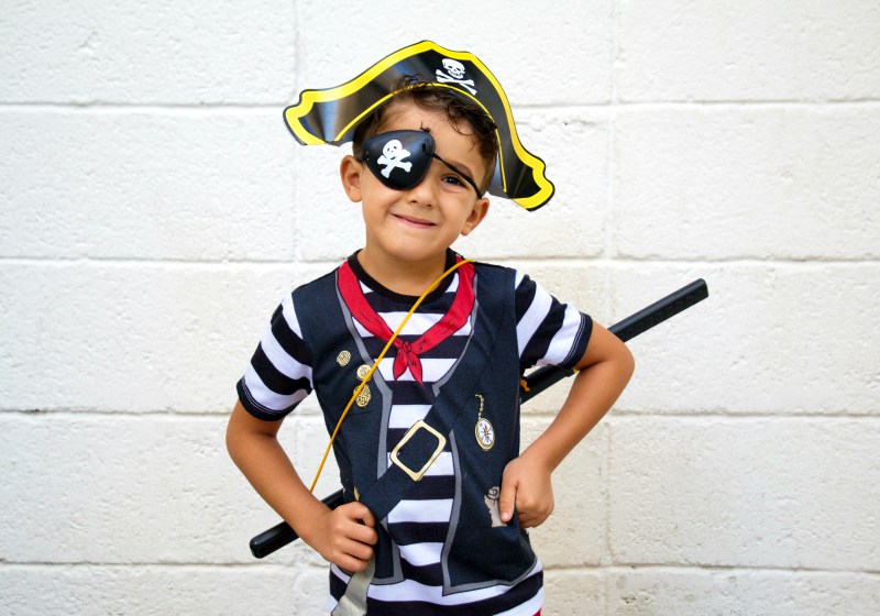 little pirate boy posing camera while | historical costume patterns free