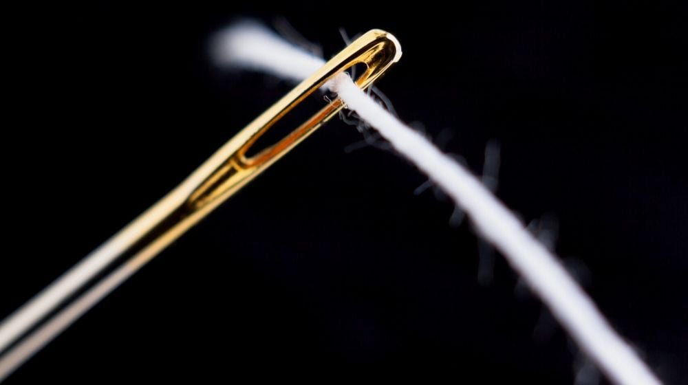 needle thread through | How To Sew A Button Like An Expert