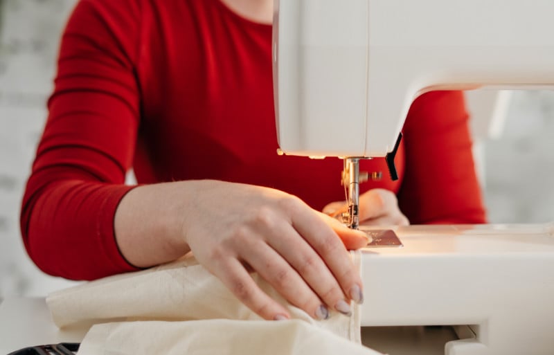 photo of woman sewing | gusset sewing