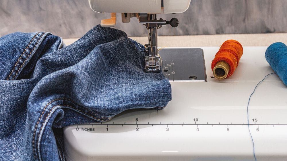 sewing machine foot on denim scissors | Great Clothes Alteration