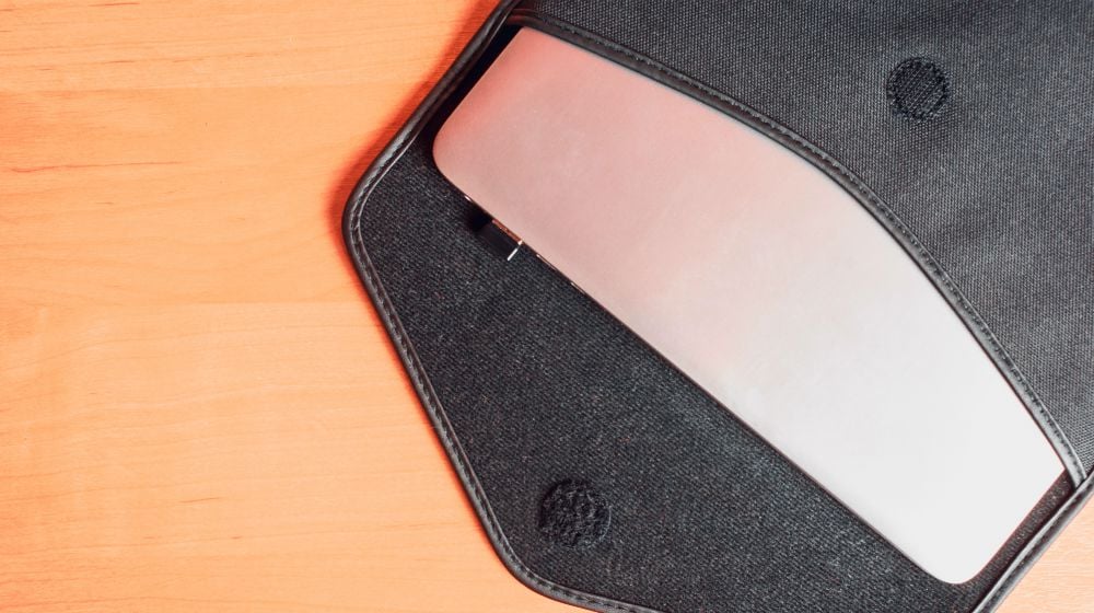 Ultra thin laptop in a bag on the desk | How To Sew A Simple DIY Laptop Sleeve In Minutes | how to make a laptop cover | Featured