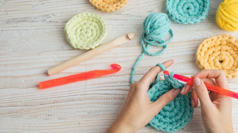 woman hands knitting crochet. hobby crafts things. Top view. Horizontal composition-crochet patterns-SW-featured