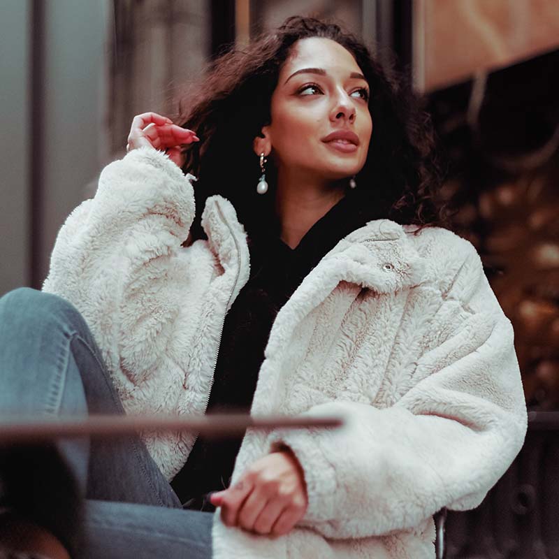 woman in white fur coat | sewing for beginners