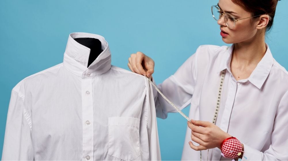 woman sewing designer mannequin shirt | Great Clothes Alteration