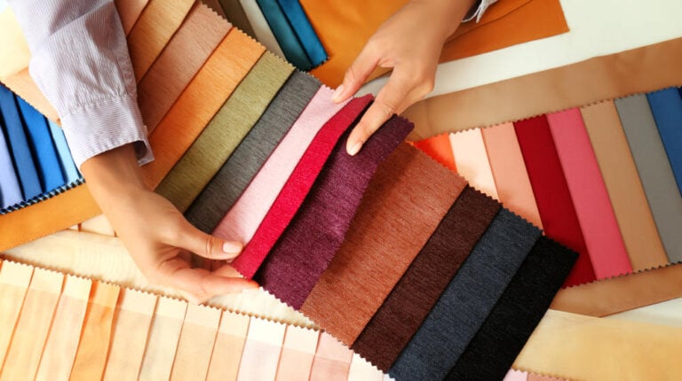 Young woman with fabric samples | Fabric Types | Everything You Need To Know | Sewing 101 | all about fabrics | Featured
